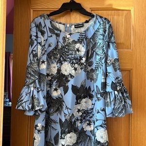 Fun fall or winter dress with mid sleeve and ruffles on the end of sleeves